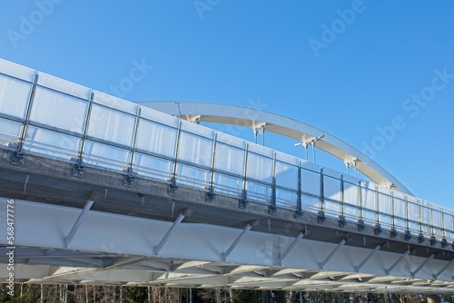 Modern bridge with clear sunny sky in winter at Ahvenkoski, Pyhtää, Finland. © Raimo