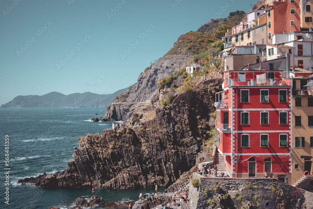 View on the colorful houses and the sea along the coastline of Cinque Terre area in Riomaggiore