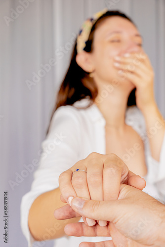 close up of wedding proposal ring on woman hand