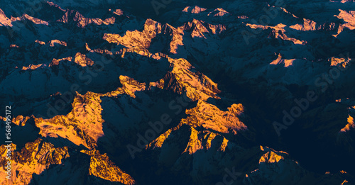 Fotografija The majesty of nature on display with an aerial view of mountains basked in the