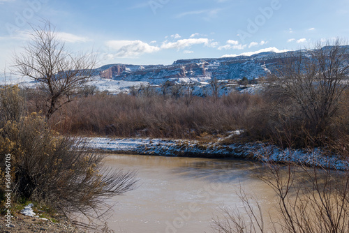 Winter scene with Colorado River and Snowy Colorado national Monument