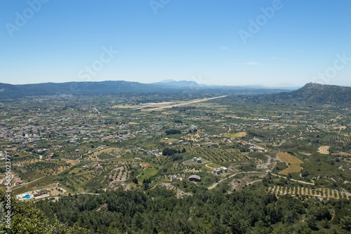 View from Mount Filerimos with farms, airport and clear sky in spring, Rhodes, Greece. photo