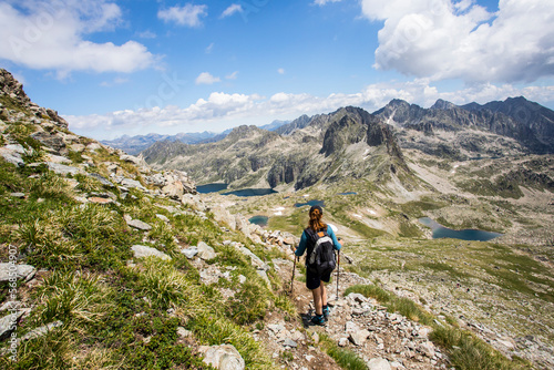 Young hiker girl summit to Ratera Peak in Aiguestortes and Sant Maurici National Park, Spain © Alberto Gonzalez 