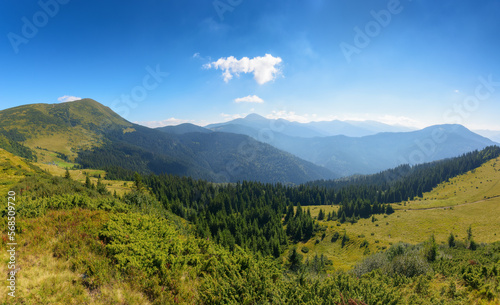 green mountain landscape. view in to the distant ridge. warm summer forenoon