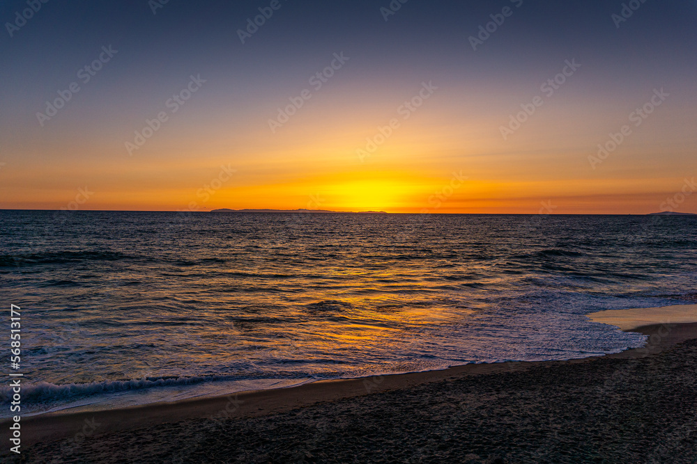 A beautiful glowing sunset in Laguna Beach, California.