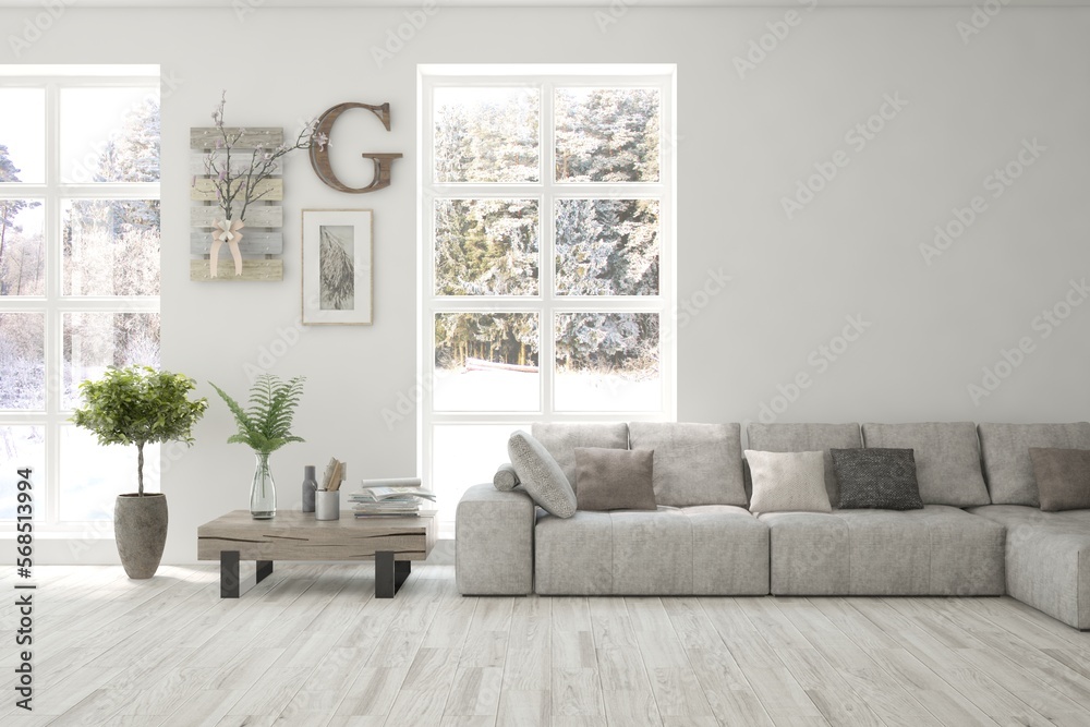 Fototapeta premium White living room with sofa and winter landscape in window. Scandinavian interior design. 3D illustration