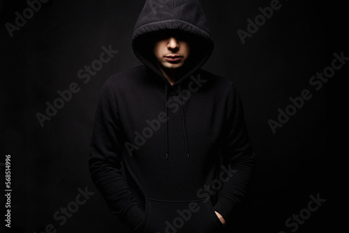 Person in Hood. Man or Boy in a hooded sweatshirt
