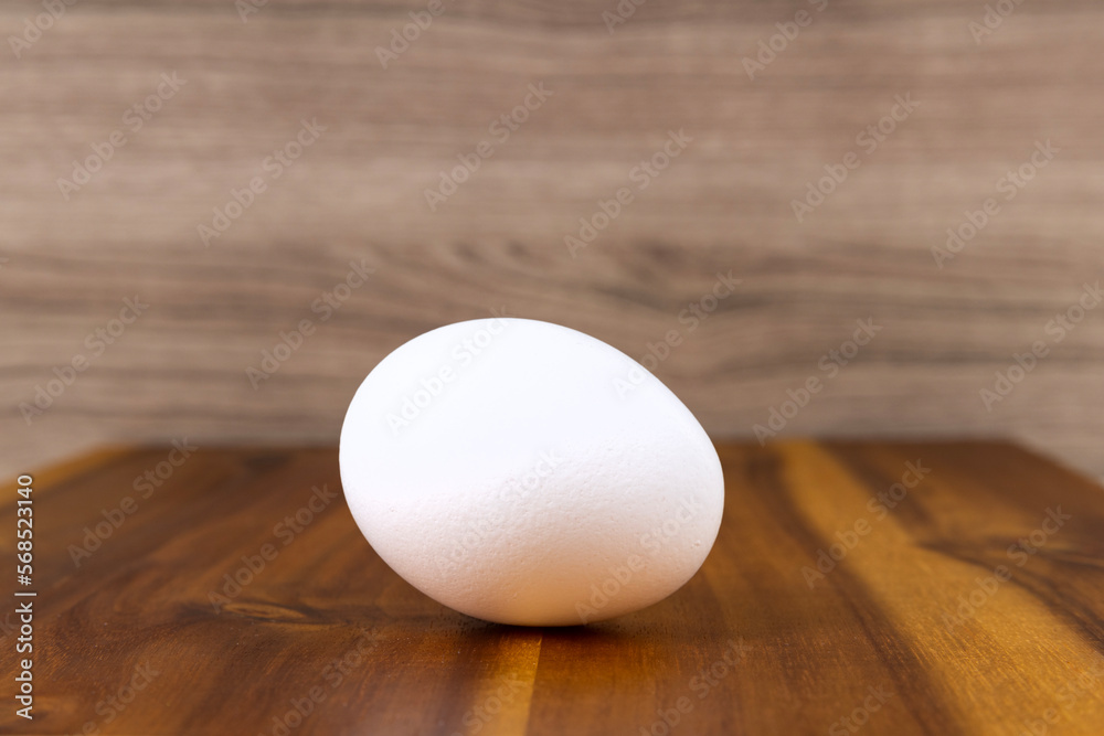 White commercial egg on a cutting board