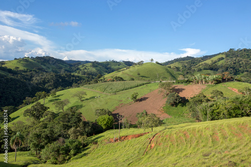 View of the green hills of Serra da Mantiqueira in the state of Minas Gerais, Brazil