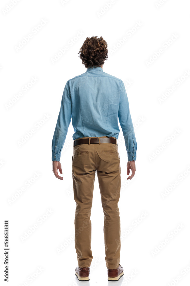 casual man turning his back at the camera casual man turning his back at the camera
