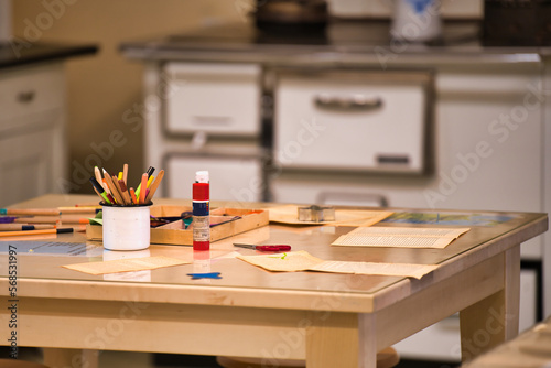 table in the kitchen 
skill stationery studying teacher watercolor workplace workshop crayons making palette artistic desktop elementary group imagination kids study create event idea schoolboy room