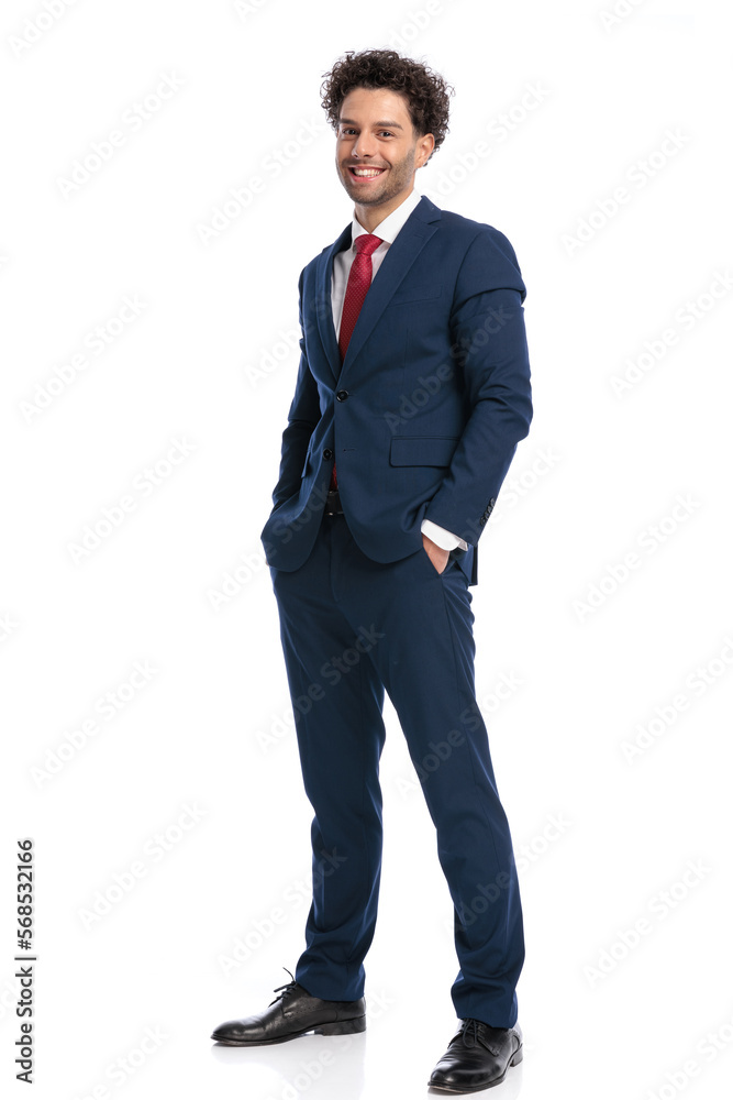 full body picture of elegant businessman with curly hair posing full body picture of elegant businessman with curly hair posing