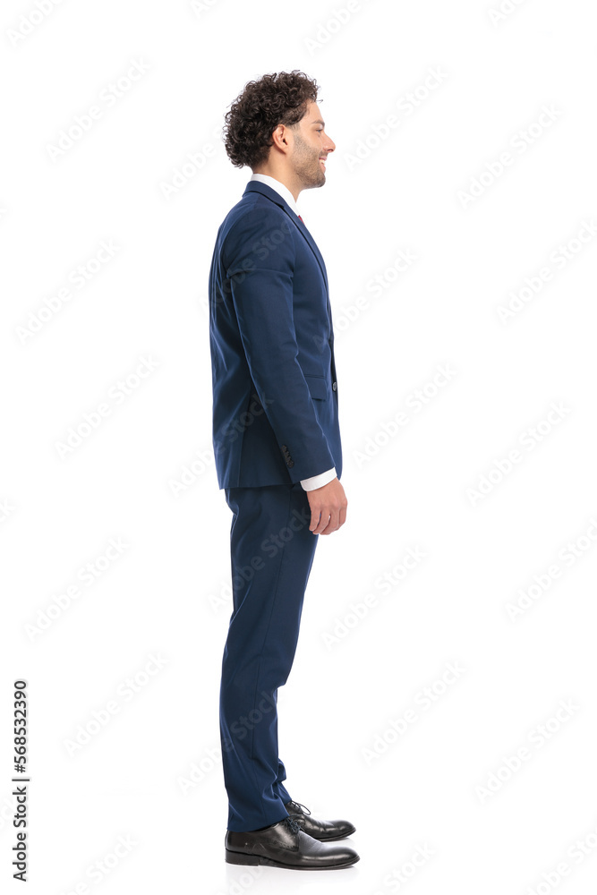 lebanese young man in navy blue suit being happy and smiling lebanese young man in navy blue suit being happy and smiling
