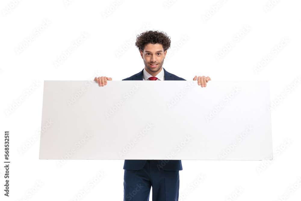 happy elegant man presenting white empty billboard and smiling happy elegant man presenting white empty billboard and smiling