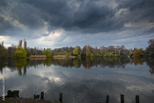 Wide angle shot over a lake with dramatic sky
