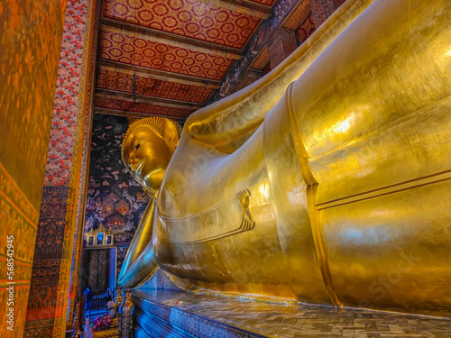 Big golden reclining buddha in the Wat Phra Chetuphon, Wat Pho temple, Bangkok, Thailand