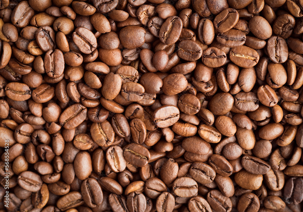 Roasted coffee beans, background, close-up, top view, flat lay. Roasted coffee beans, background, close-up, top view, flat lay.
