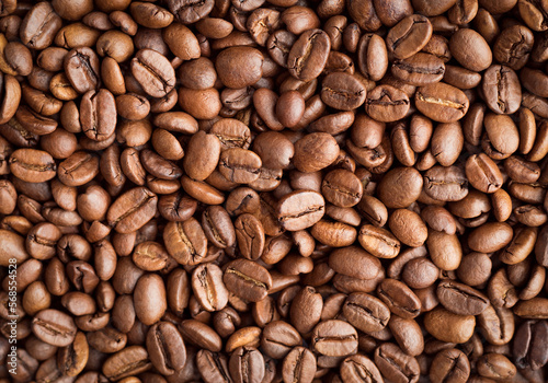 Roasted coffee beans, background, close-up, top view, flat lay.