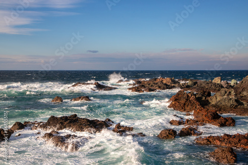 Ocean water crashing between rocks on the coast of Sines - Portugal © sebi_2569