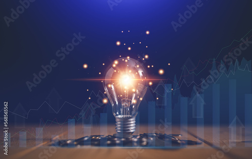 Business growth concept, Finance and banking, Ideas for business success and progress in the future. Stack of coins with light bulb and graphs for planning analysis. Forecast for success.