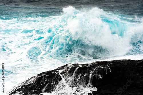 North coast of Gran Canaria, Canary Islands, waves breaking against dark lava rocks.