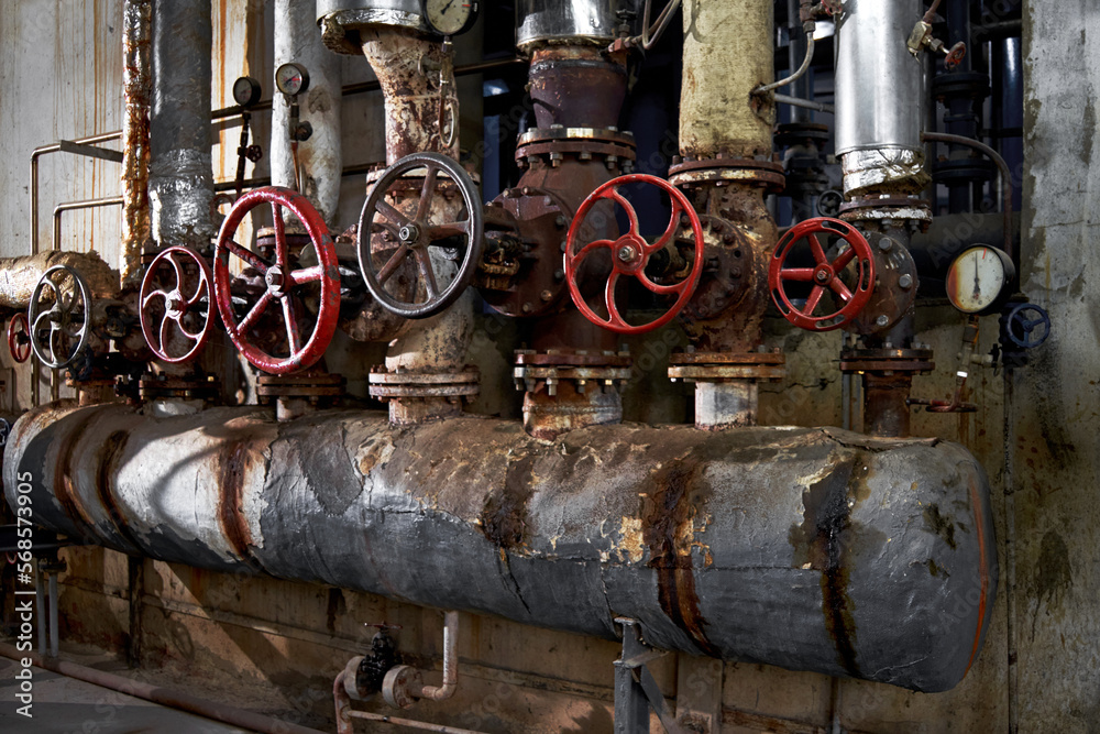 boiler room for the production of steam of factory industrial production. old pipe system from the boiler room boiler room for the production of steam of factory industrial production. old pipe system from the boiler room