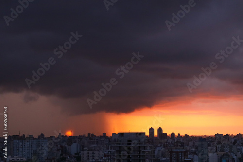 Sunset over the city, before the storm