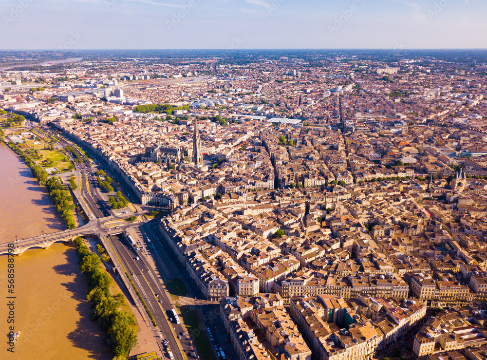 Day aerial cityscape of Bordeaux city and Garonne river in France