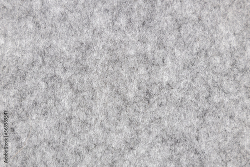 Gray felt texture. Fabric texture surface, close up.