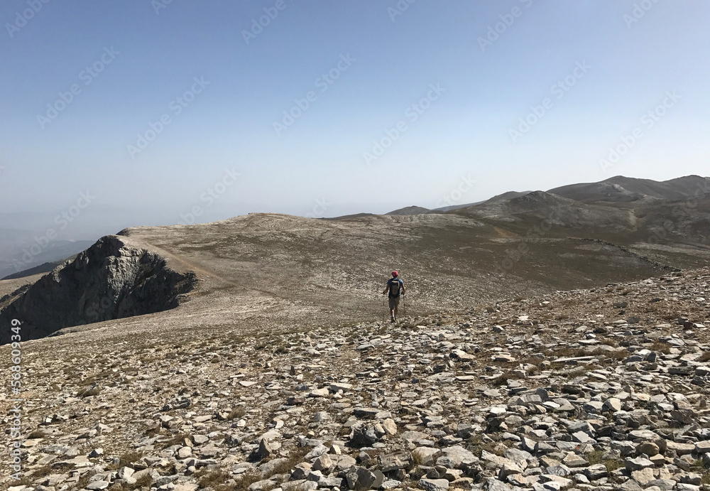 Mountaineer hiking at Mount Uludag Great Summit Route in Bursa, Turkey. Uludag is the highest mountain in Marmara Region.