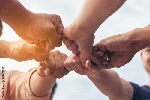 Close up hands Teamwork group of multi racial people meeting join hands. Diversity people hands join empower partnership teams connect volunteer community. Diverse multiethnic Partners team together photo