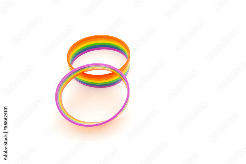 Rainbow wristbands are on a white background Rainbow wristbands are on a white background