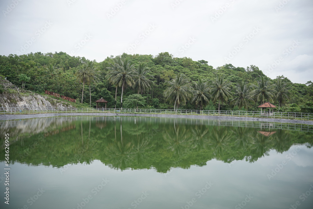 Grigak Reservoir in Gunungkidul, Yogyakarta, Indonesia. Become a rainwater reservoir and a tourist spot by the sea.
