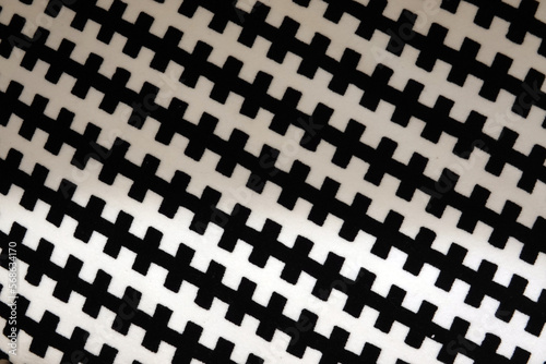 Black and white lattice pattern on a white background. Texture. Abstract geometric