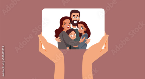 Hands Holding a Family Picture Vector Cartoon Illustration. Person revisiting old photo for memory sake and nostalgia 
