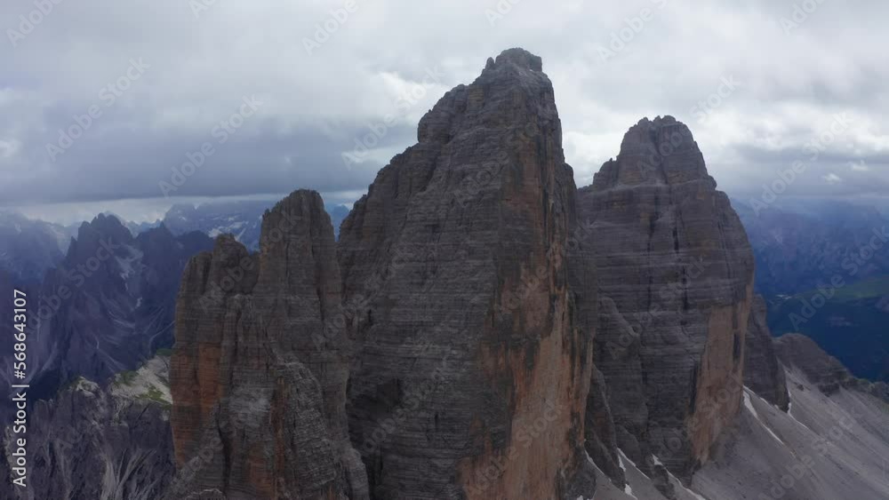 Aerial View Of Tre Cime Di Lavaredo. Slow Parallax Shot Left. Establishing Shot Aerial View Of Tre Cime Di Lavaredo. Slow Parallax Shot Left. Establishing Shot