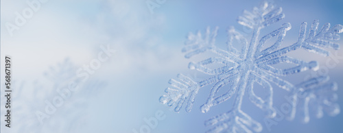 Elegant Christmas Wallpaper with Frosty Snowflake. Seasonal Banner with copy-space.