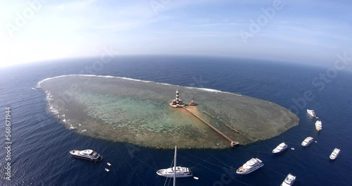 Aerial Drone Shot for the Daedalus Reef lies 180km south of Brother Islands. The reef is huge, surrounded by a sheer wall all around. shot on 4K and 50 Frames photo