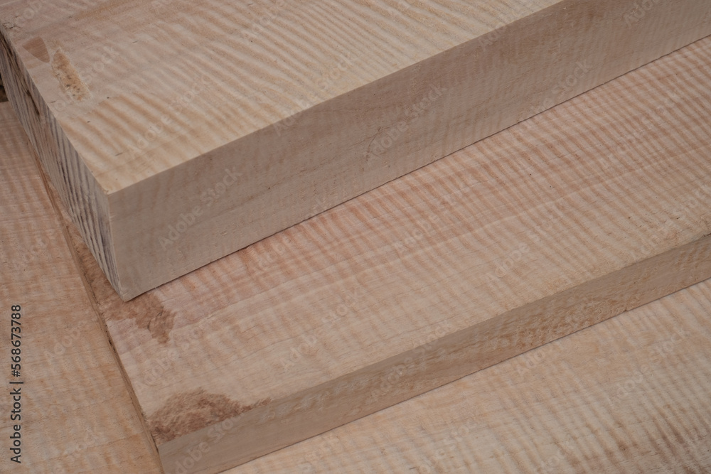 Maple wood sawed timber has tiger stripe or curly stripe grain Maple wood sawed timber has tiger stripe or curly stripe grain