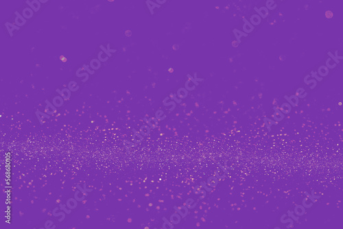 Gold shining particles on purple background. Abstract image