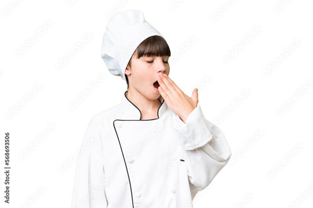 Little caucasian chef girl over isolated background yawning and covering wide open mouth with hand Little caucasian chef girl over isolated background yawning and covering wide open mouth with hand