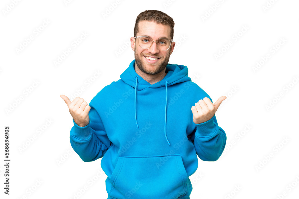 Fototapeta premium Young handsome blonde man over isolated chroma key background with thumbs up gesture and smiling