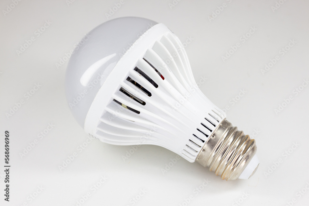 Energy saving LED light bulb on white background. Energy saving concept. Energy saving LED light bulb on white background. Energy saving concept.