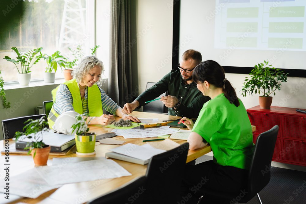 Businessman, employee and engineer having a meeting in conference room Businessman, employee and engineer having a meeting in conference room