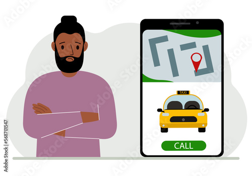 A man next to a large smartphone on the screen which has a taxi and geolocation. The concept of a mobile taxi application or ordering a taxi online.