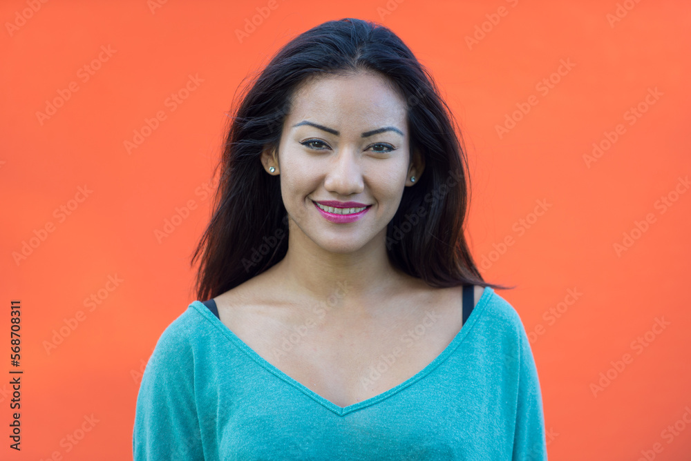 Fototapeta premium Young asian female teen portrait on colored background