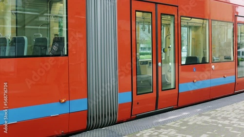 Wide shot man carrying bike off street car photo