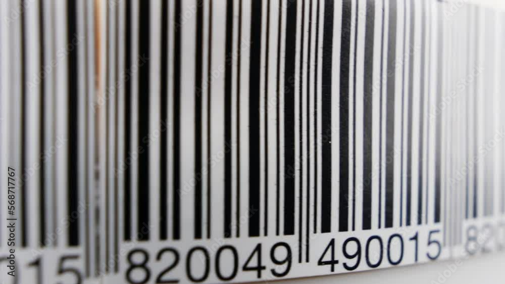 Barcode. Product code label on a conveyor belt. Production line, close up shot Barcode. Product code label on a conveyor belt. Production line, close up shot