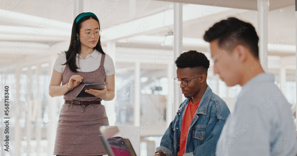 Asian business woman, tablet or mentor in digital marketing company, advertising coworking space or branding education. Creative designer, speaker or team work meeting diversity with kpi technology