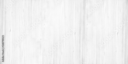 Whitewashed wooden textured surface. White painted plywood wide texture. Light wood grain widescreen rustic background © JAYANNPO